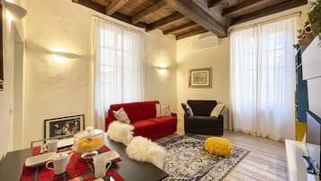Superior Apartment, Courtyard Area | Living area | 40-inch Smart TV with digital channels