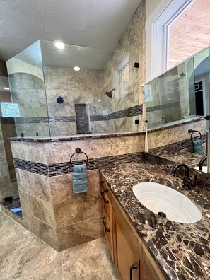Hair dryer, towels, soap, shampoo
