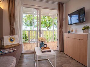 Living area - Tenuta Primero Lodge Deluxe für 4 Personen (Grado)