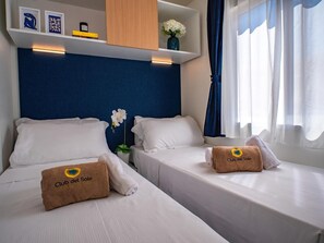 3 室のベッドルーム、WiFi (無料)、ベッドシーツ