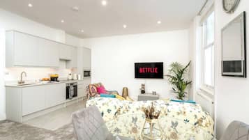 1 dormitorio, tabla de planchar con plancha, cuna de viaje y wifi gratis