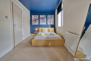 4 bedrooms, iron/ironing board, travel cot, WiFi