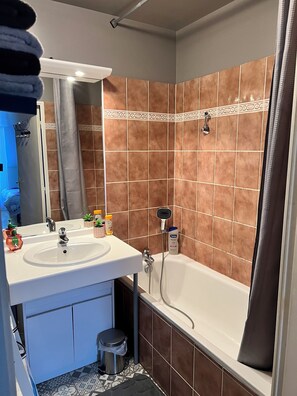 Hair dryer, towels, soap, toilet paper