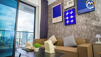 2 Bedrooms | Living room | 19-cm Smart TV with digital channels, streaming services