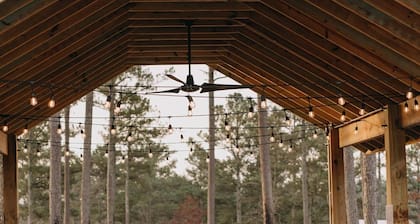 A secluded haven on 5,000 acres in NW Georgia, just 45 minutes from Atlanta and Chattanooga, and a quick 10-minute drive to downtown Rome. Explore private trails along the Etowah river, bask in wildlife, and gaze at mesmerizing stars. Your perfect es