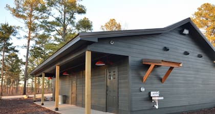 A secluded haven on 5,000 acres in NW Georgia, just 45 minutes from Atlanta and Chattanooga, and a quick 10-minute drive to downtown Rome. Explore private trails along the Etowah river, bask in wildlife, and gaze at mesmerizing stars. Your perfect es