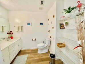 Hair dryer, towels, soap, shampoo