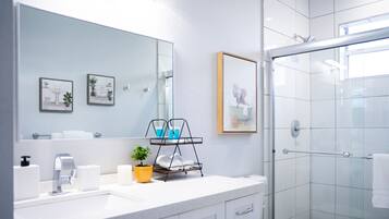Hair dryer, towels, soap, shampoo