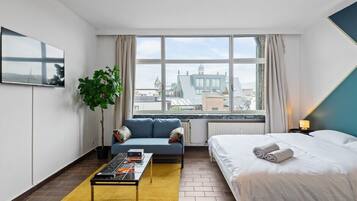 1 slaapkamer, een strijkplank/strijkijzer, internet, beddengoed