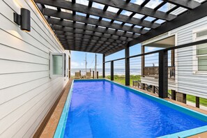 Outdoor pool, a heated pool - Luxurious Beachfront Oasis w/ Private Pool & Elevator (Bolivar Peninsula)