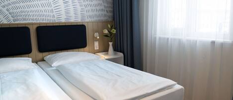 2 quartos, berço de viagem, Wi-Fi de cortesia