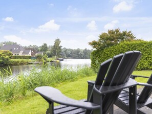 Cloud, Water, Sky, Plant, Tree, Natural Landscape, Chair, Outdoor Furniture, Land Lot, Lake
