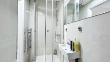 Eco-friendly toiletries, hair dryer, towels