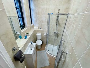 Eco-friendly toiletries, hair dryer, towels