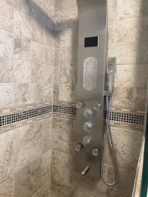 Shower, jetted bath, hair dryer, bidet