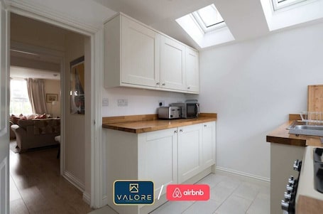 Fridge, microwave, oven, stovetop. Lovely Home, Great Location & Superb Value!