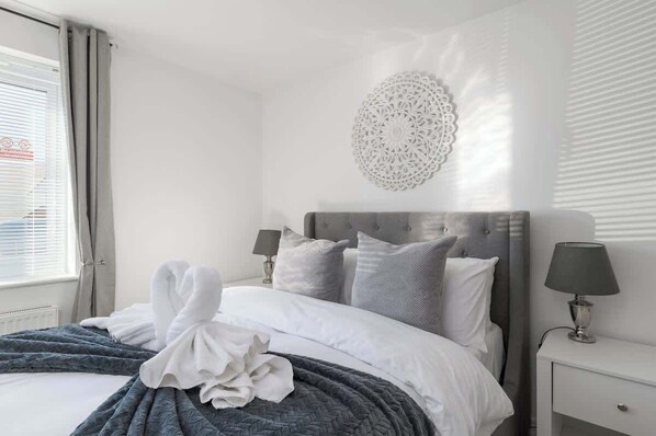 Iron/ironing board, travel crib, WiFi, bed sheets