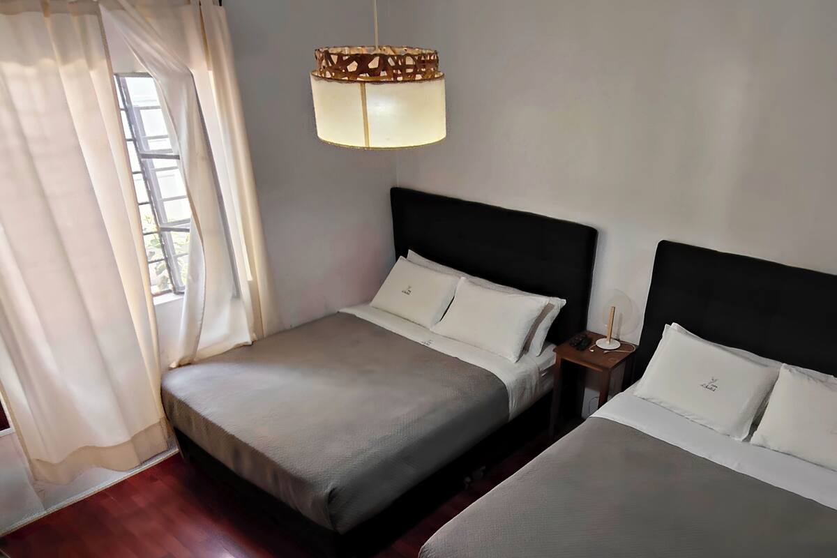 Family Room | Down comforters, minibar, free WiFi