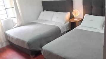 Habitación familiar | Edredón, minibar y wifi gratis