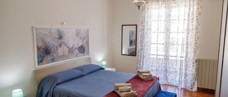 2 habitaciones, tabla de planchar con plancha, wifi y ropa de cama