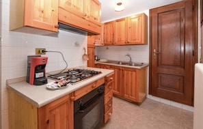 Fridge, microwave, stovetop, cookware/dishes/utensils