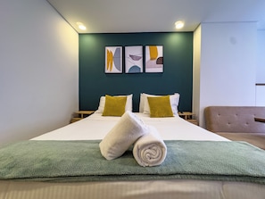 Premium bedding, down duvets, memory-foam beds, in-room safe