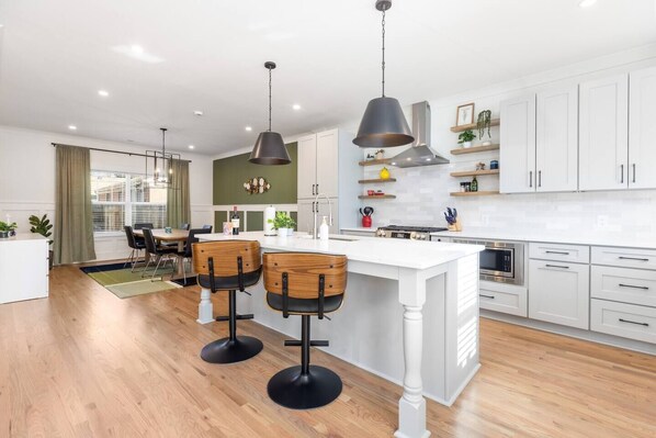 Fridge, microwave, oven, stovetop - Epic Group Stay: 2 Homes + Hot Tubs + Yard Games (Charlotte)