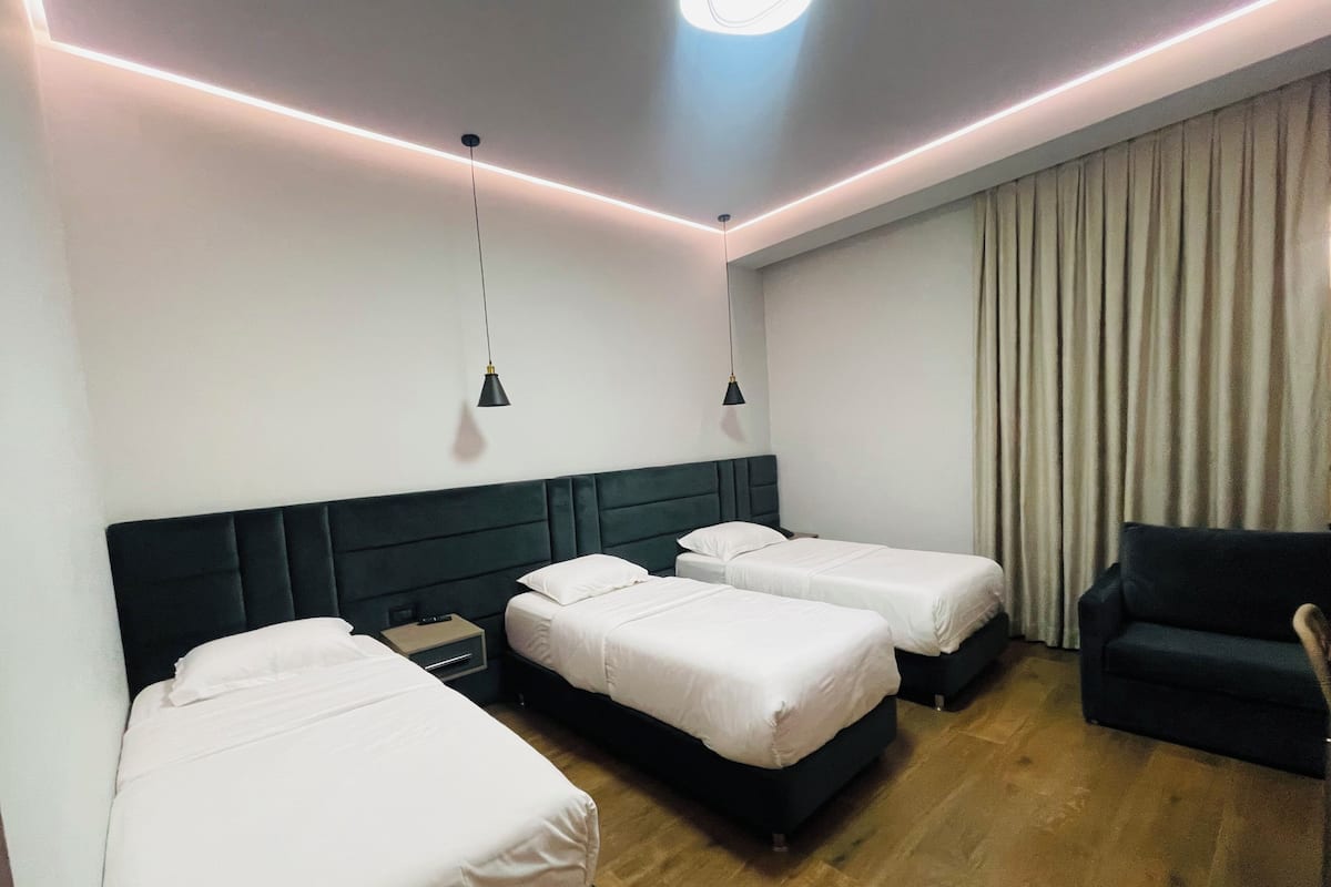 Premium bedding, down comforters, desk, WiFi (free)