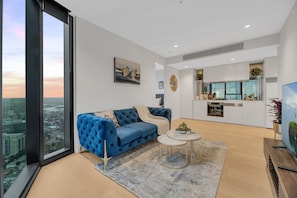 55-inch flat-screen TV with cable channels - Melbourne Square Apartments (Southbank)