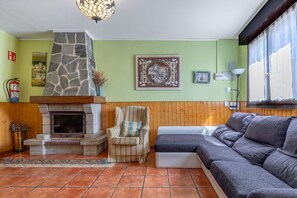 TV, fireplace - Holiday Home Angela with Private Terrace, Balcony and Wi-Fi (Isla)