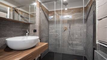 Shower, free toiletries, hair dryer, towels