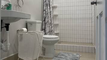 Shower, jetted tub, towels, soap