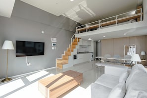 Family Suite Room (Ocean View) | Living area | Smart TV, Netflix, heated floors, streaming services - SR Hotel Yeongjong (Incheon)