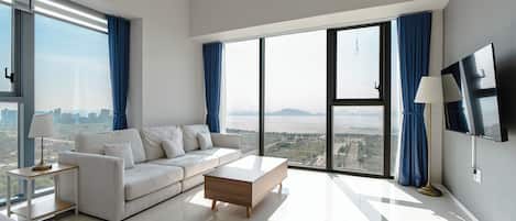 Family Suite Room (Ocean View) | Living area | Smart TV, Netflix, heated floors, streaming services