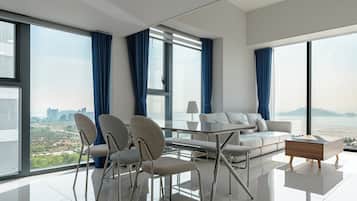 Family Suite Room (Ocean View) | Living area | Smart TV, Netflix, heated floors, streaming services