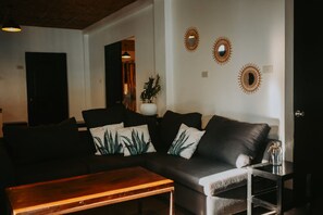 Comfort Shared Dormitory | Living area | 32-inch LED TV with cable channels - Everyday Sunday Hotel Cafe (Santa Fe)