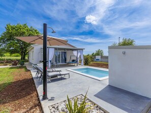 Et oppvarmet basseng