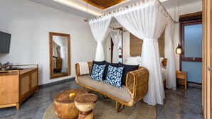 Un dormitorio moderno con una cama con dosel, un armario de madera y un televisor.