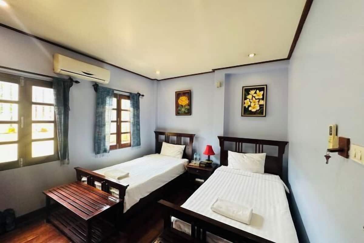 Premium bedding, down comforters, desk, laptop workspace