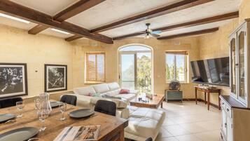 Family House, Multiple Bedrooms (Dionisia Gozitan Villa and Pool Gozo) | Living area | 21-inch flat-screen TV with satellite channels