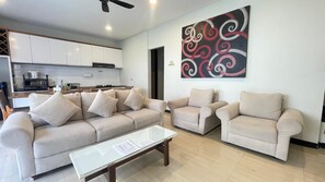 Villa Bradley | Área de estar | TV LED 64 polegadas com canais a cabo