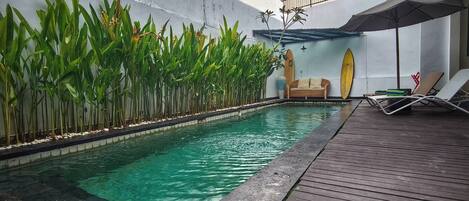 Villa Cathy | Living area | 64-inch LED TV with cable channels