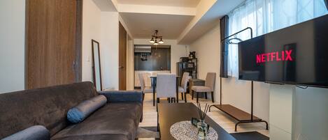 Business-Apartment | Wohnbereich | Flachbildfernseher