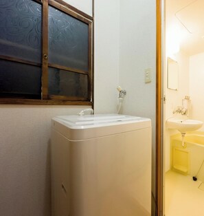 Hair dryer, bidet, towels, soap