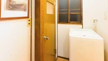 Hair dryer, bidet, towels, soap