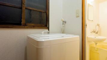 Hair dryer, bidet, towels, soap