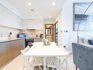 Dining - Cityscape Splendor Lavish 1BR Uptown  (Dubai)