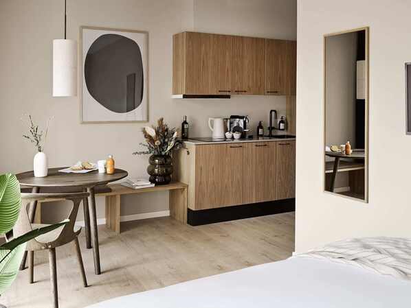 1 habitación, tabla de planchar con plancha, cuna de viaje y wifi