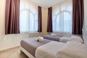 2 chambres, fer et planche à repasser, Wi-Fi, draps fournis
