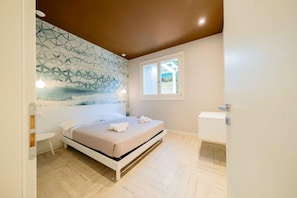 1 slaapkamer, een strijkplank/strijkijzer, wifi, beddengoed